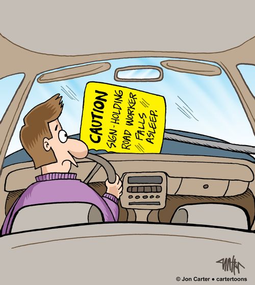 Man in car sees fallen sign on the hood of his car which says, CAUTION sign-holding road worker falls asleep.