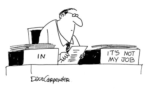 Desk trays - 'In' and 'It's not my job'.