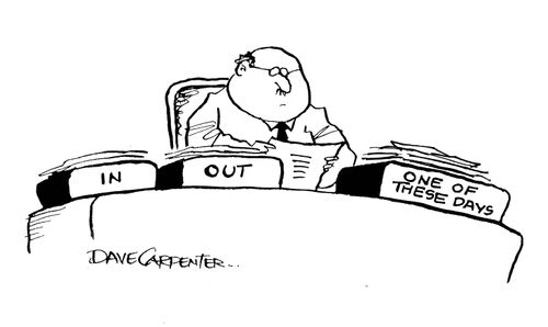 Desk trays - 'in', 'out', and 'one of these days'.