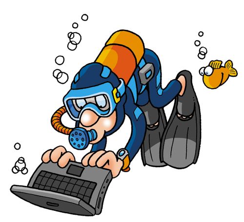 Scuba Diver using laptop under water.
