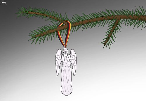 Angel christmas ornament weeps over the Berlin terror attack