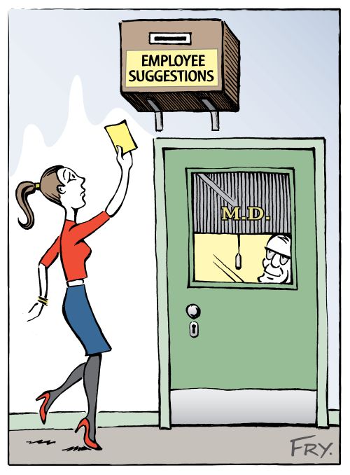 'Employee Suggestions' box too high on wall for woman to reach with smiling bossing looking on.