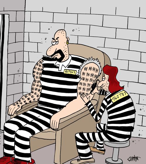 Prisoner giving another prisoner hashmark tattoos on his arm to track days in prison.
