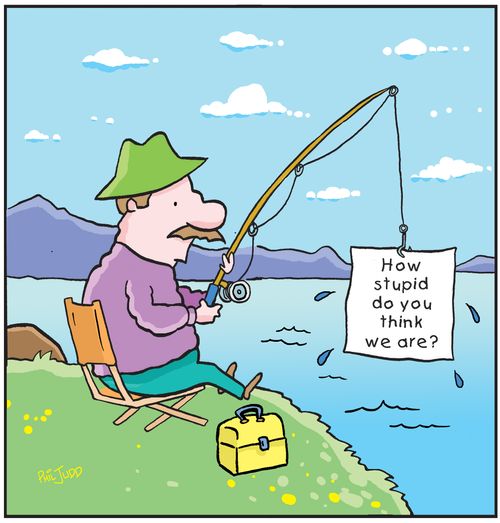 Man sitting on bank pulling fishing rod out of water with sign from fish saying 'How stupid do you think we are?'