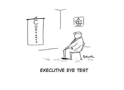 Business man under going an eye test and reading letters which spell customer.