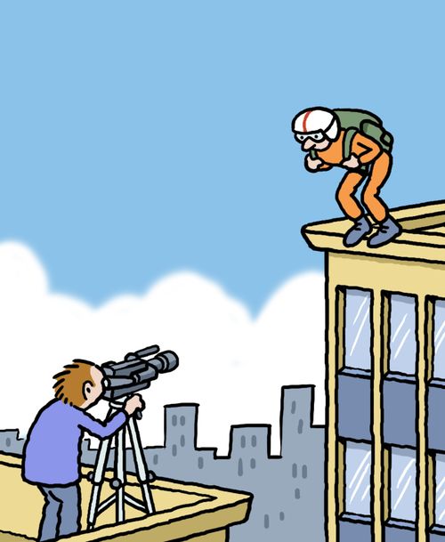Base jumper being filmed about to jump off a building.