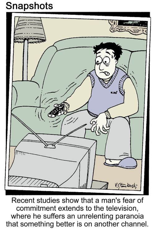 Man's fear of commitment extends to the television, where he cannot decide on a program.