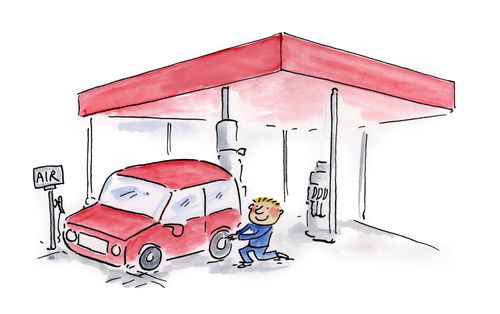 Checking tires at the garage.