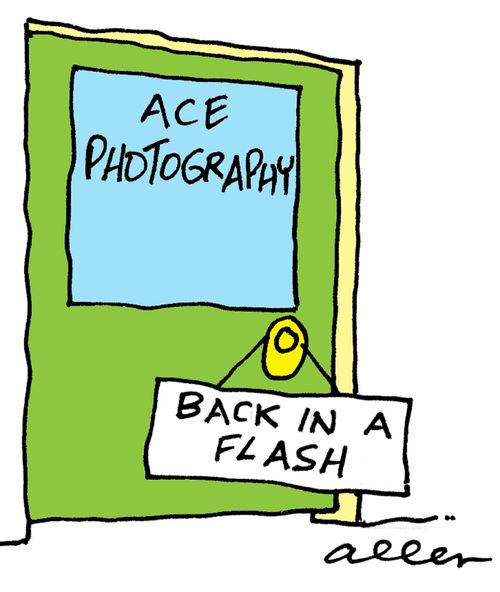 Sign on photographic business: Back in a flash.