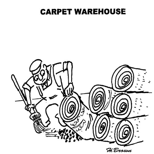 Man sweeping the dirt under the carpet at the carpet warehouse.