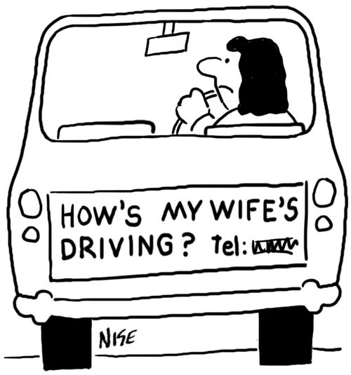 Woman's car has sticker on the back saying 'How's My Wife's Driving'.