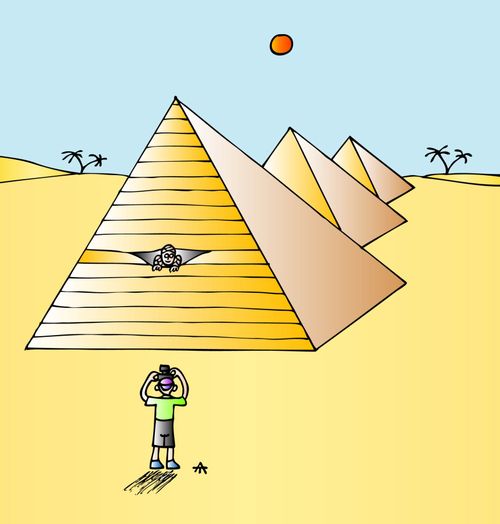 Mummy peeks out of a pyramid.