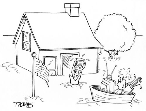 Man carrying fish bowl with fish from flooded house.