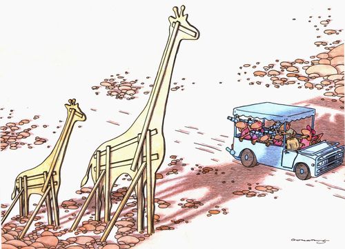 Tourists viewing fake giraffes on safari