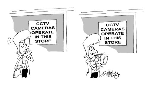 CCTV Cameras Operate in this Store - Woman puts makeup on.