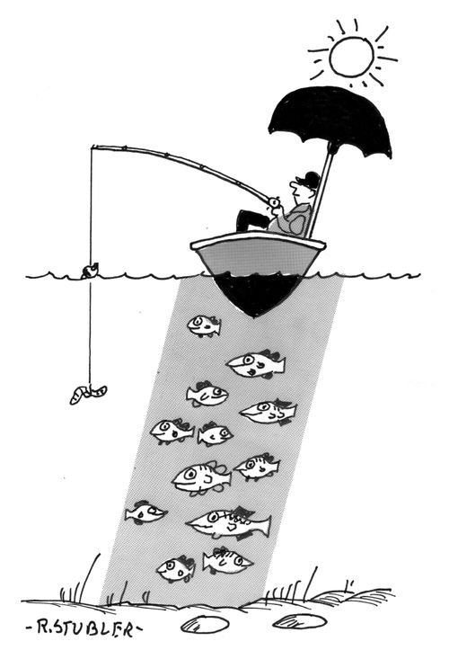 Fisherman in boat with umbrella