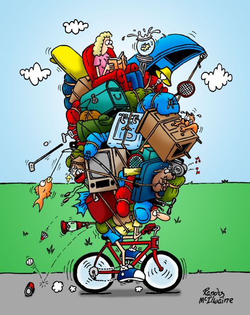 Man biking with an enormous amount of things on his back.