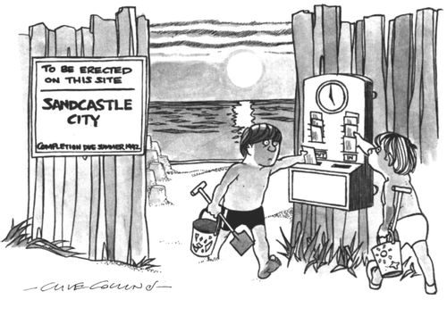 Children building 'Sandcastle City'.