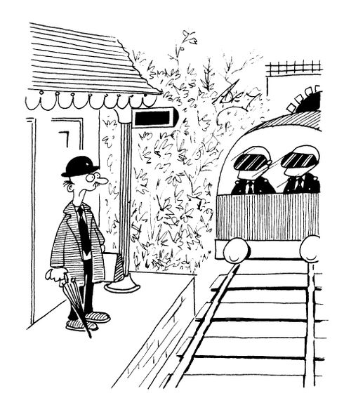 Train being driven by two men with visors