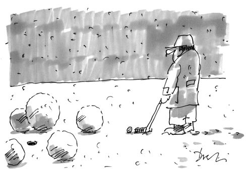 Man in artic weather playing sport with snow balls