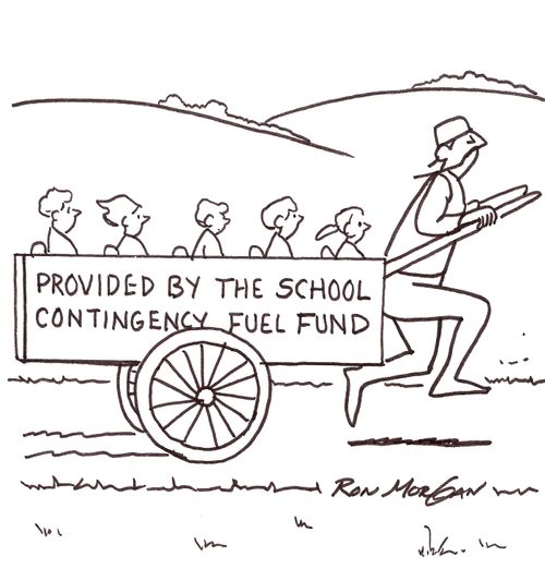 Children are pulled in cart privided by the school contingency fuel fund.