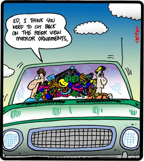 'Ed, I think you need to cut back on the rear view mirror ornaments.'