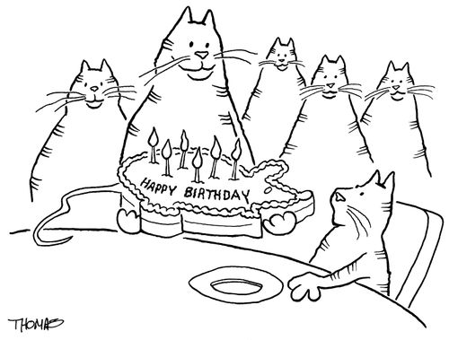 Cat receives mouse-shaped birthday cake.