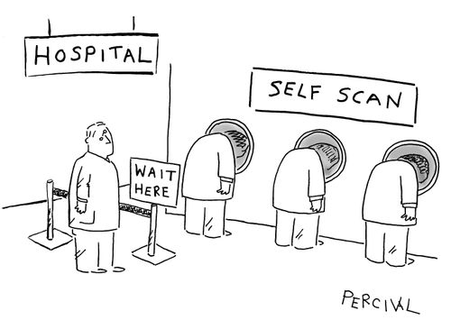 Man waiting in line to self scan himself at a hospital.