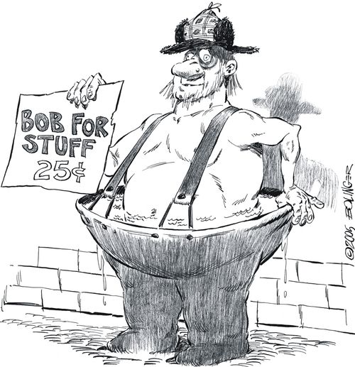 Man in filled waders - 'Bob for stuff'.