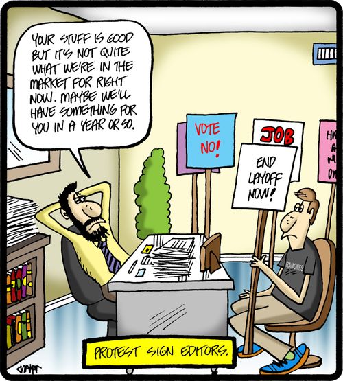 Protest sign editors: 'End Layoff Now!'