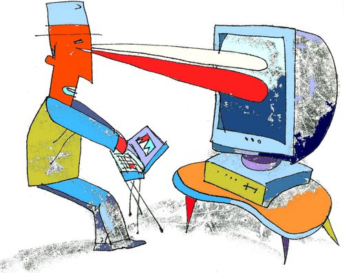 Person with eyes focused on a computer screen.