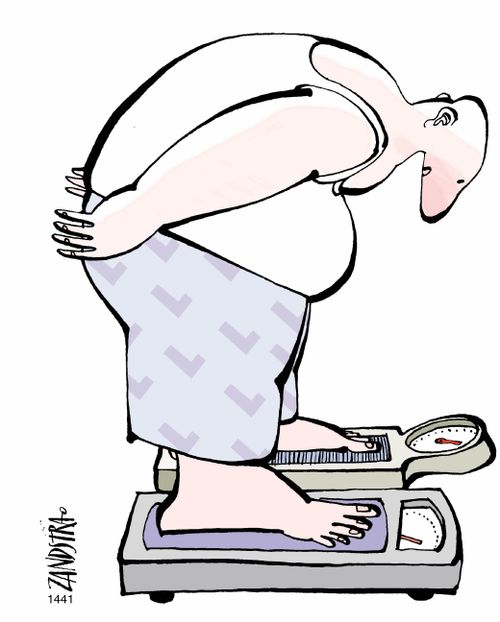 Man with each foot on a set of scales.