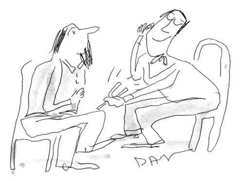 Man tapping a tuning fork on another man's knee