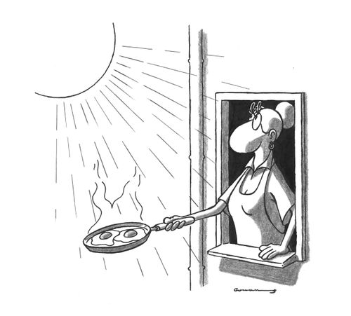 Woman cooking eggs by direct sunlight.