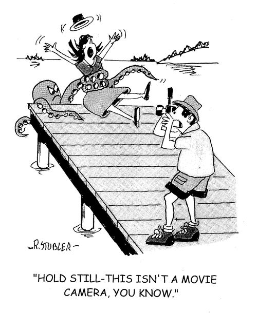 'Hold still - this isn't a movie camera, you know.'