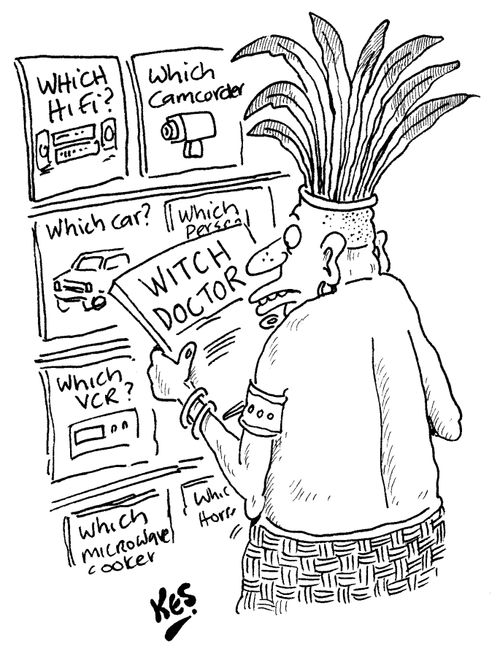 Shaman reads magazine entitled 'Witch Doctor'.