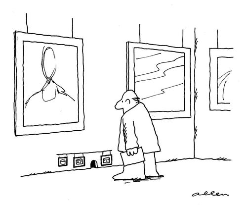 Man in art gallery looking at mouse hole with small pictures also hanging on wall.