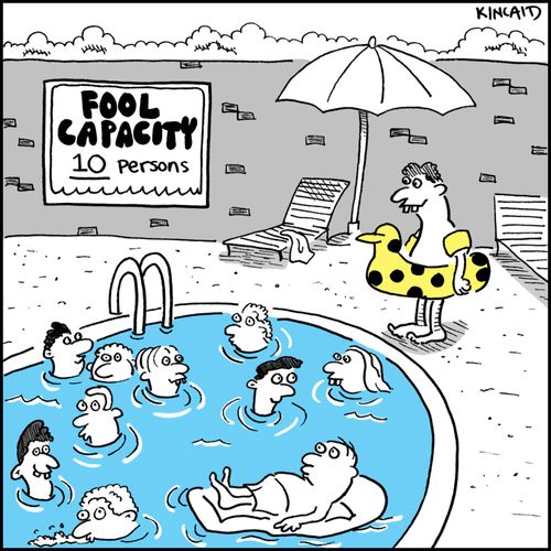 Pool scene with sign that reads 'Fool Capacity 10 persons'.