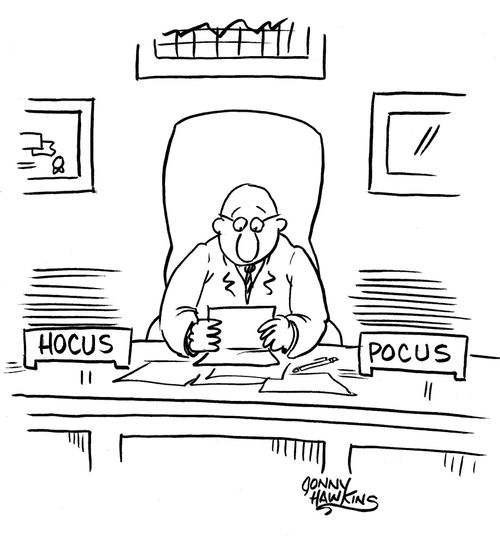 Businessman with in and out boxes marked: 'Hocus' and 'Pocus'