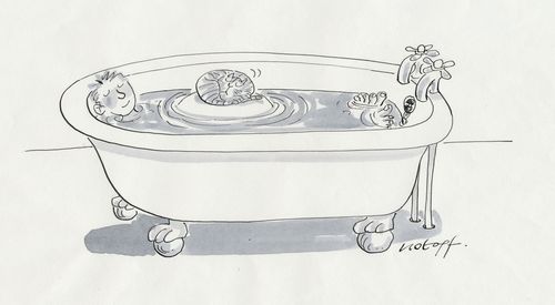 Cat asleep on man's stomach - an island in the bath.