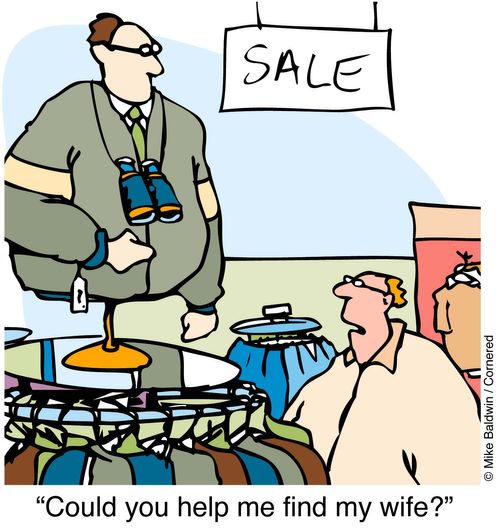 Short sighted man talking to mannequin. - "Can you help me find my wife?"