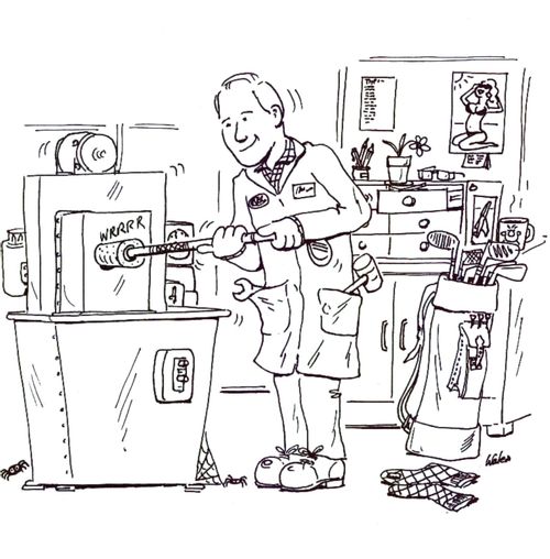 Honer at his honing machine.