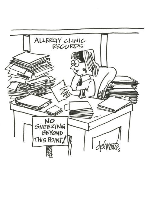 Woman has a sign at Allergy Clinic Records Dept. No Sneezing Beyond This Point!