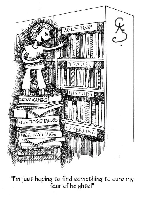 Person looking for self help book to cure fear of heights, whilst perched on top of large pile looking at top shelf.