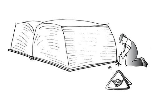 Man at work on his book.