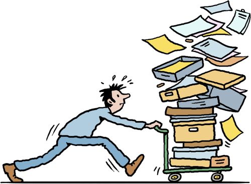 Office worker pushing a pile of papers on trolley.