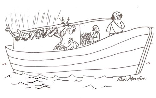 Noah wears hearing protection as animals howl.