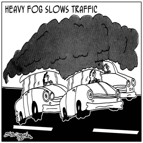 Heavy Fog Slows Traffic.