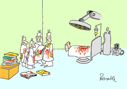 Surgeons consulting a text book.