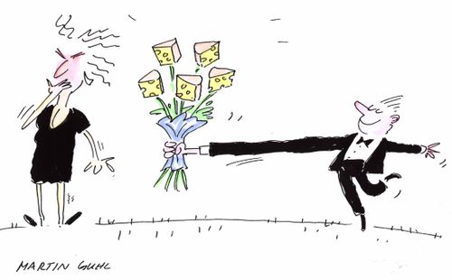 Woman disgusted by a pose of chessy flowers  offered by man